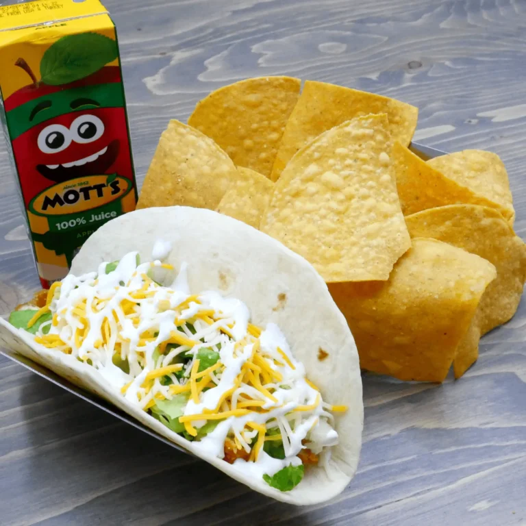 Crispy chicken taco (1) with chips & juice
